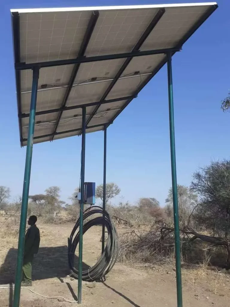 Solar array under a canopy at a field installation